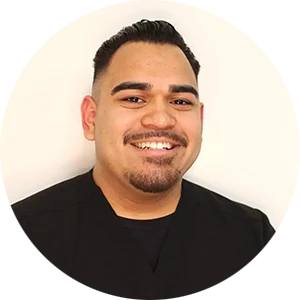Professional portrait of Eric Corrales, the dedicated Office Manager ensuring a smooth and welcoming patient experience at My La Mirada Dentist